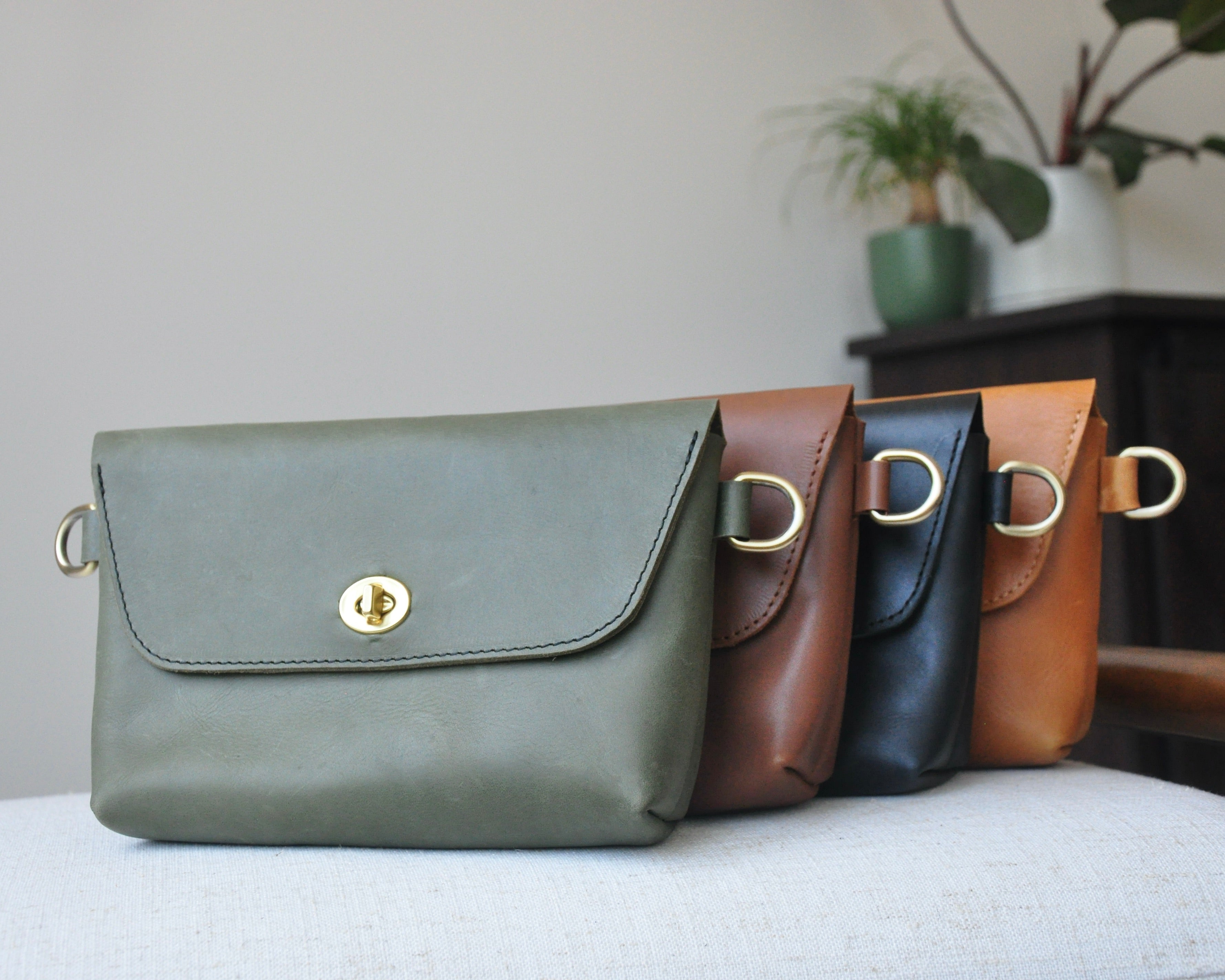 Crossbody Fanny Pack handmade from high-quality genuine leather with adjustable strap, brass hardware, and twist lock closure. Full-grain leather Belt Bag with pocket for phone.