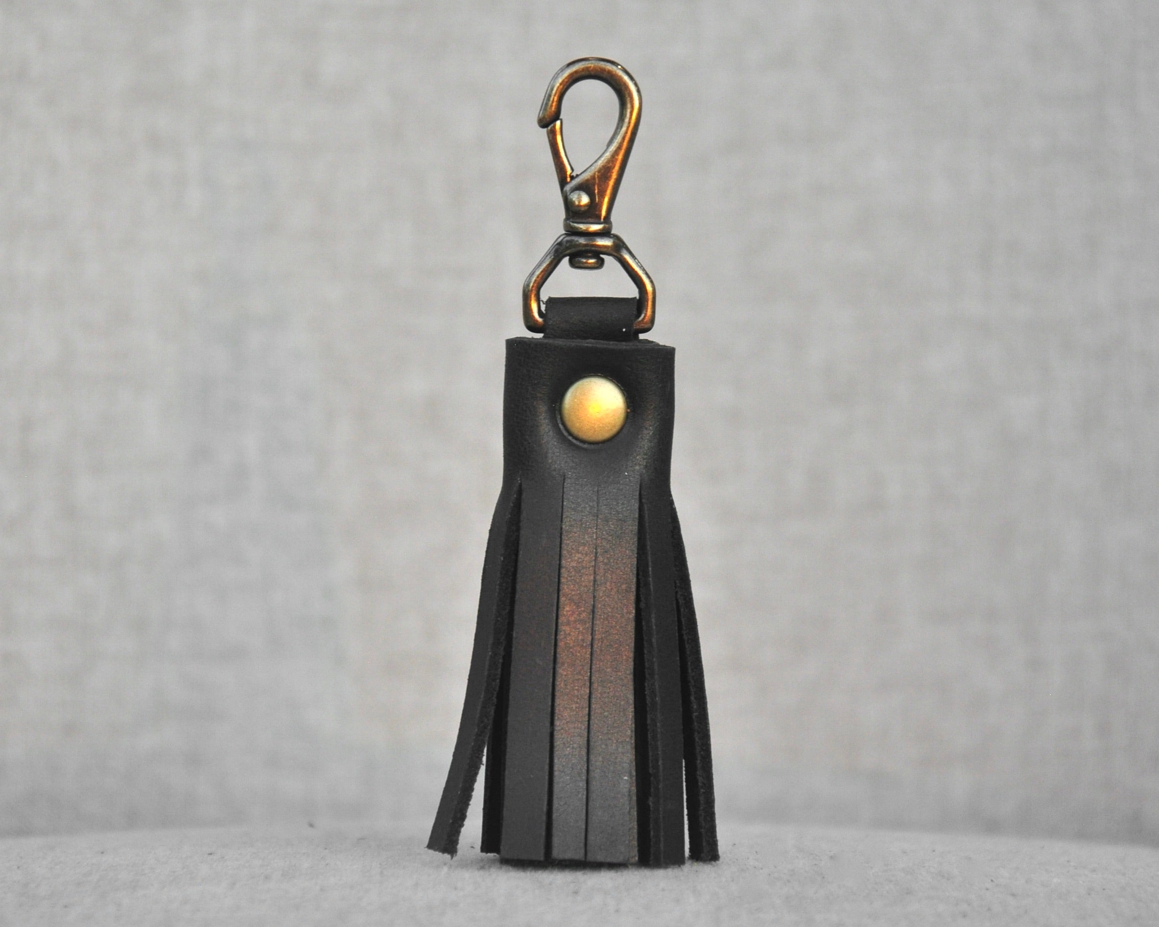 Tassel style leather purse charms with keychain hook and gold hardware