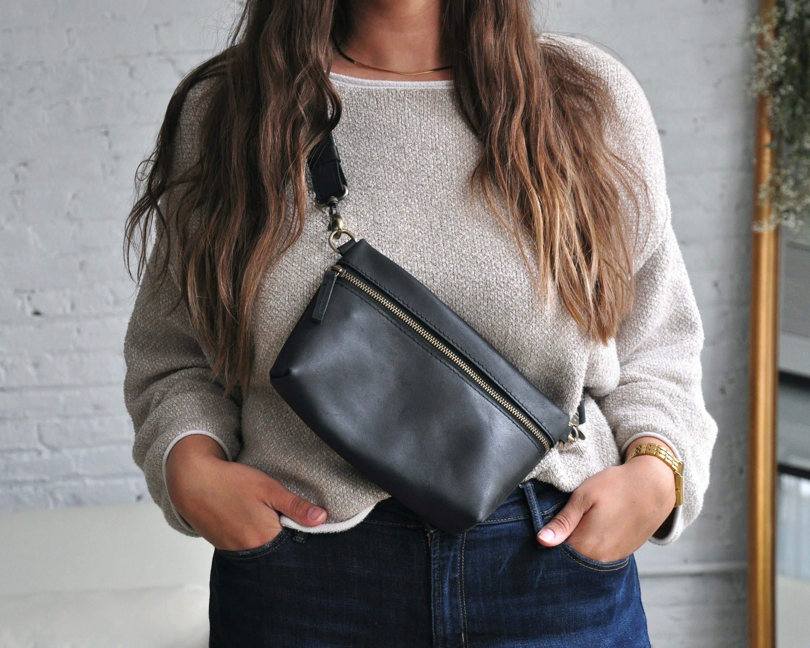 Crossbody Fanny Pack in black handmade from high-quality genuine leather with adjustable strap, brass hardware, and zipper closure. Full-grain leather Belt Bag.