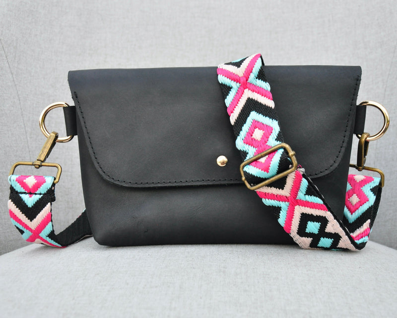 Geometric Crossbody Strap in Pink, Blue, and Black on a Leather Bag