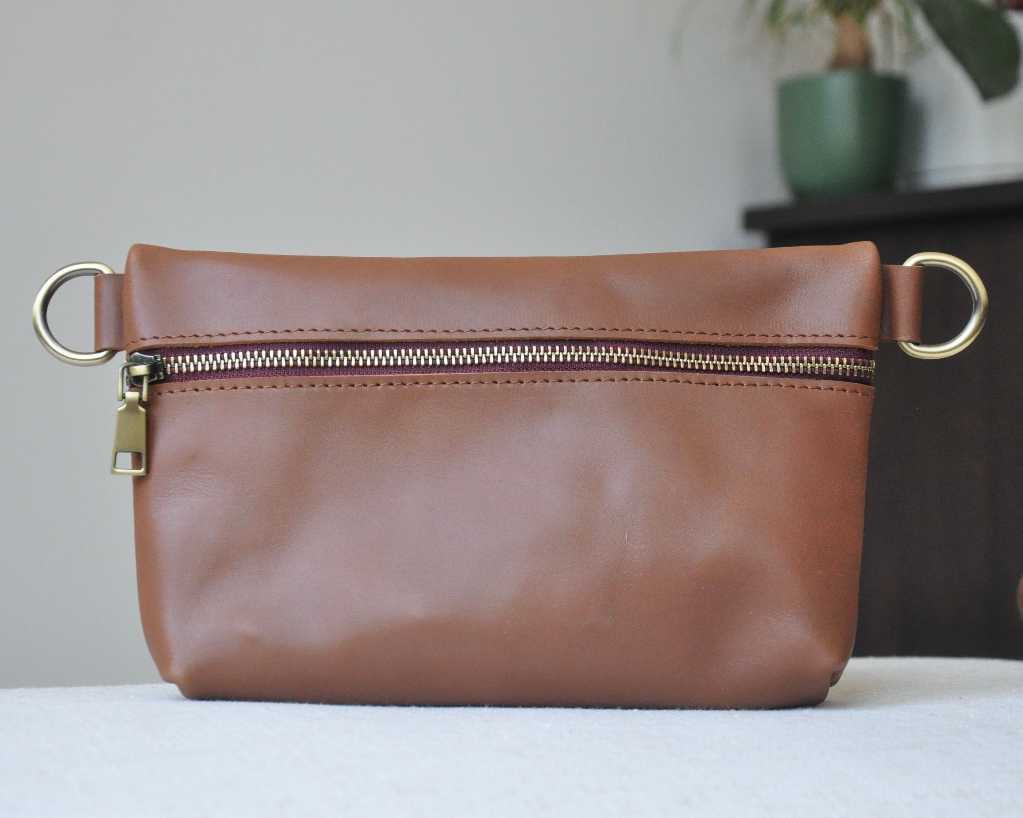 Crossbody Fanny Pack in brown handmade from high-quality genuine leather with adjustable strap, brass hardware, and zipper closure. Full-grain leather Belt Bag with pocket for phone
